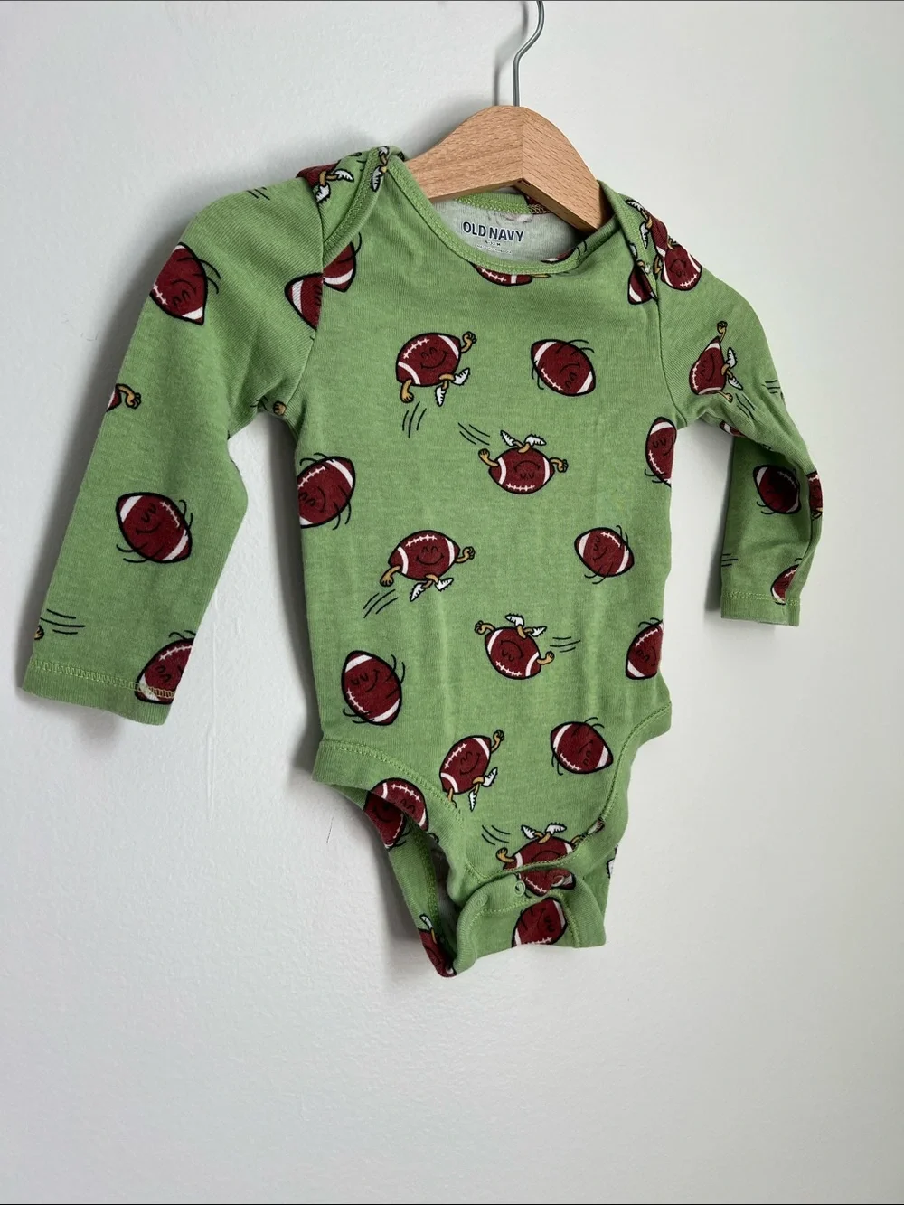 Old Navy | Green Football-Print Long-Sleeve Baby One-Piece 6-12 Months